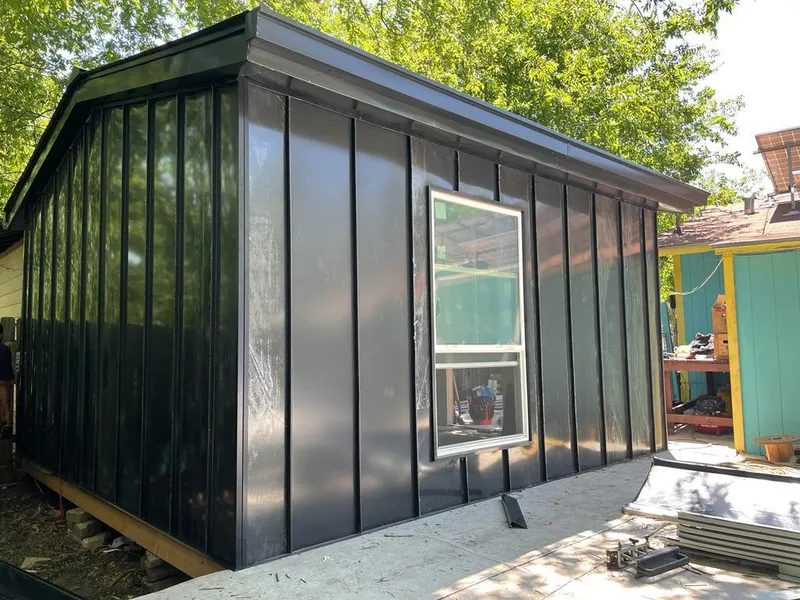 Black standing seam metal wall panels for Roof Inspection in Sheridan