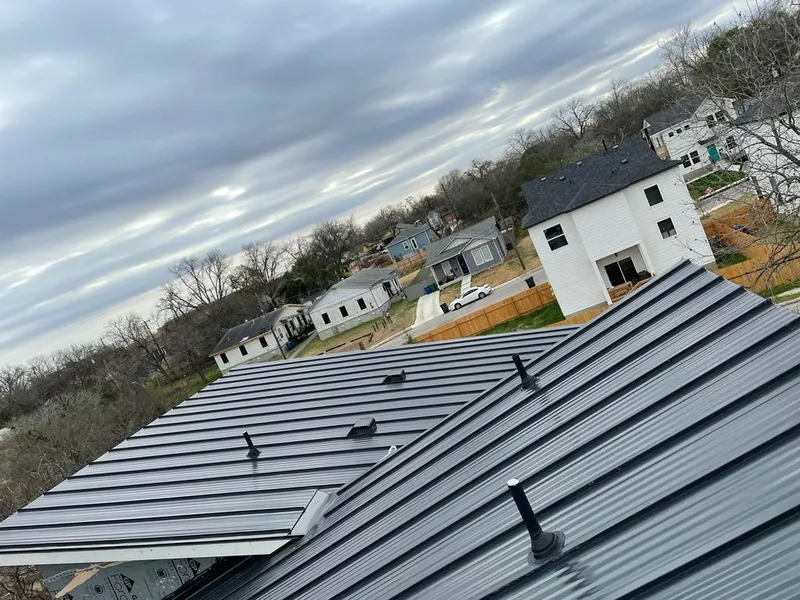 Standing seam metal roof panels with vents for Skylight Repair in Sheridan
